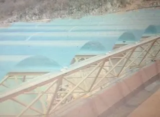 Domos tipo arco cañón en techo de nave
